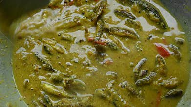 Small Snakehead or Channa orientalis fish curry.