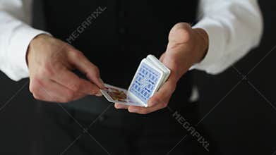 Man showing trick with playing cards