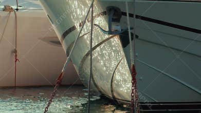 Front view of a yacht\'s bow with anchor