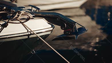 Close up of a polished chrome anchor wit