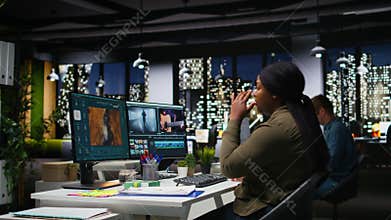 Fatigued drained videographer works on film montage with migraine