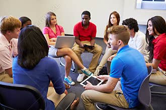 High School Students Taking Part In Group Discussi