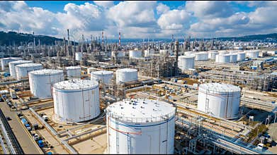 Aerial view of expansive oil refinery infrastructure, industrial tanks of large factory, energy, fuel and gas