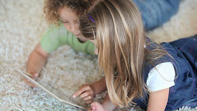 Close up of children using a tablet computer