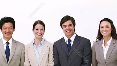 Business team walks and poses