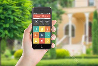Black mobile smart phone with smart home application icons on th