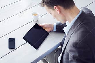 Man using tablet pc on the office