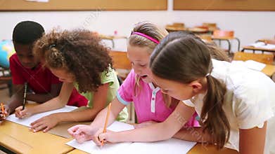 Happy pupils working together