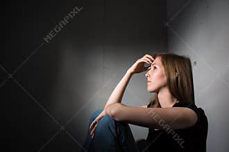 Young woman suffering from a severe depression