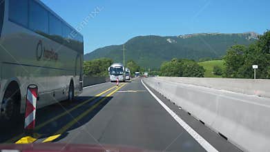 Driving on road from Switzerland to France on Highway.