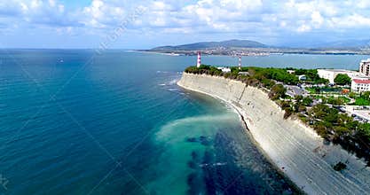 The Resort Of Gelendzhik. Thick Cape from a bird`s-eye view. Gelendzhik lighthouse, high cliff. Small waves in the sea
