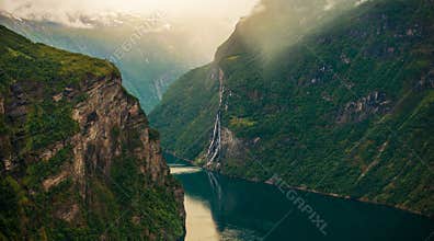 Geiranger Fjord And Steep Cliffs In Norway