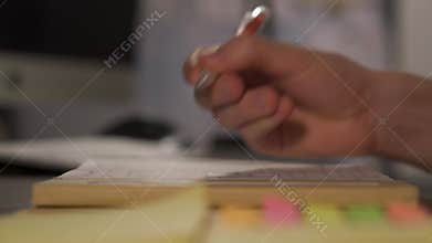 Checkmarking The Activities Completed On The Checklist - closeup shot