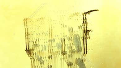 Erasing belief back to the reality concept video. Close up Hand cleaning mirror wiping out belief word revealing reality word