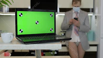 Quarantine. Businessman working on laptop at home office.. Covid-19