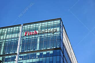 London, United Kingdom - February 03, 2019: Fitch Ratings logo signage at top of their Headquarters in UK other is in New York,