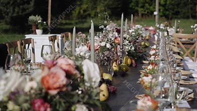 Beautifully decorated banquet table in nature