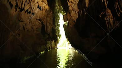 Moving Through Water-Filled Cave Toward Bright Light Outside