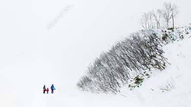 A family in the snow