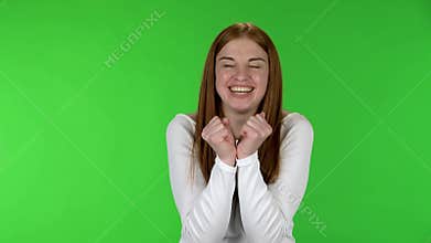 Portrait of pretty young woman with shocked and surprised wow face expression.
