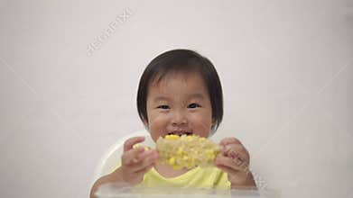 Asian Chinese Toddler dinner time with many expressions