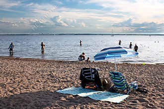Beach with people in water