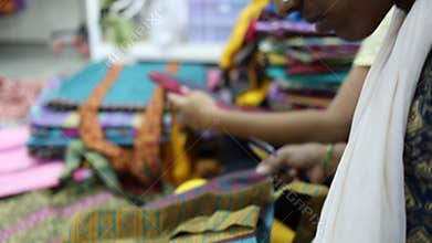 Artisan working on fabrics, Mumbai, Maharashtra, India. Nov. 15th 2019.