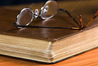 Glasses on Bible
