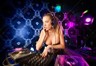young blonde lady DJ playing music