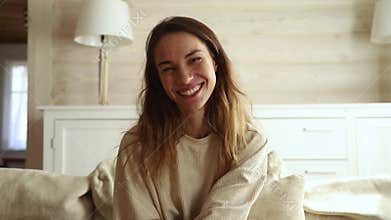 Happy woman talking video calling on skype looking at webcam