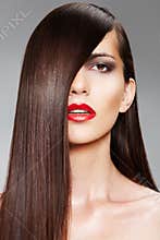 Wellness. Сosmetics. Woman with shiny long hair