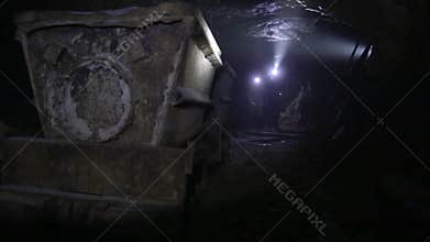 Mine Shaft. Interior of a mining shaft with diminishing perspective and copy space.
