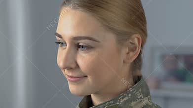 Beautiful proud servicewoman looking in camera, army profession, patriotism