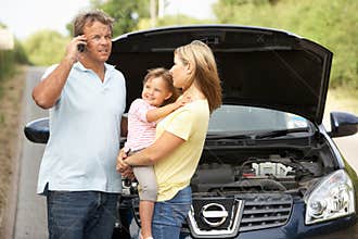 Family Broken Down On Country Road