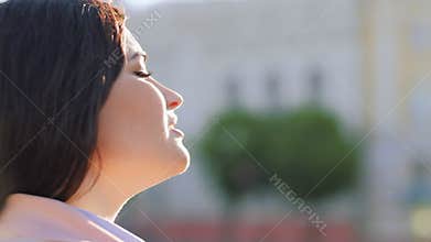 Meditation inspiration woman eyes closed relaxing