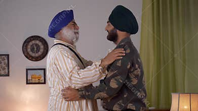 Emotional Scene: Indian soldier leaving for duty, bidding goodbye to aged father - Family scene at separation