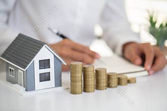 Investors signed a contract,  Buying and selling real estate. Property investment and house mortgage financial concept,  Copy