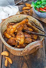 Chicken drumsticks in ginger beer sauce