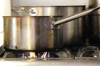 Pots and Saucepan on Gas Stove