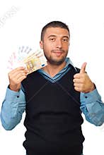 Man holding euro money and give thumbs