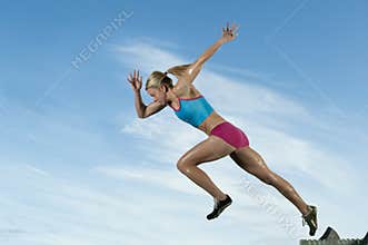 Track runner bursts off starting block