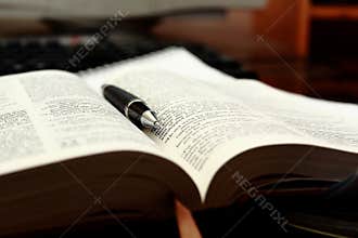 Opened Bible for Bible study in library