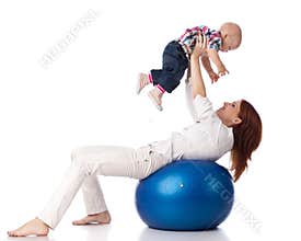 Happy family with fitness ball.