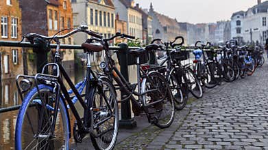 Bikes parked along the canal