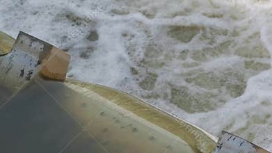 Iron weir on the river, regulation of water flow