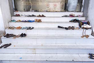Nuwara Eliya, Sri Lanka: 03/20/2019: Shoes left outside Hindu Temple