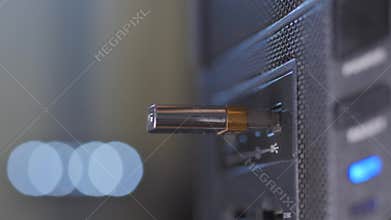 Work with computer. Copying files to a USB drive. The flash drive is inserted into the system block port.