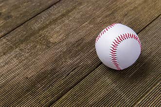 Baseball Ball On Old Wooden Table. Team sport