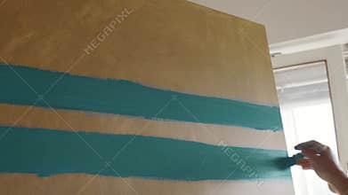 Professional creative artist painting an abstract artwork