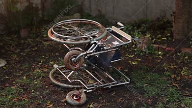 Bloody Wheelchair in the Rain 01